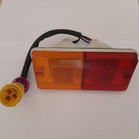 Фонар покажчик поворот/стопу задній DW244 ДТЗ  кругла фішка білий 140х65 (115 між болтами)